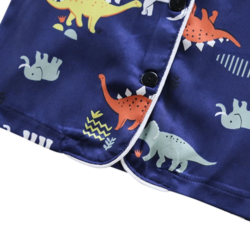 Cozy and Cute: Kids Dinosaur Print Pajama Set for Sweet Dreams!