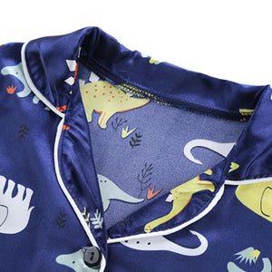 Cozy and Cute: Kids Dinosaur Print Pajama Set for Sweet Dreams!