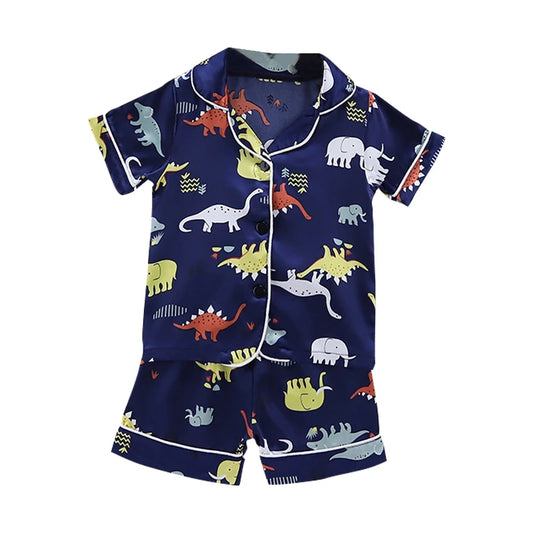 Cozy and Cute: Kids Dinosaur Print Pajama Set for Sweet Dreams!